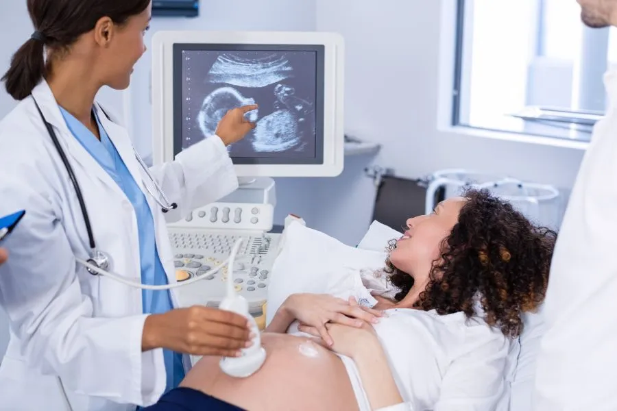 woman at ultra sound to see baby development